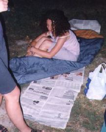 Homeles Katia is sleeping on newspapers